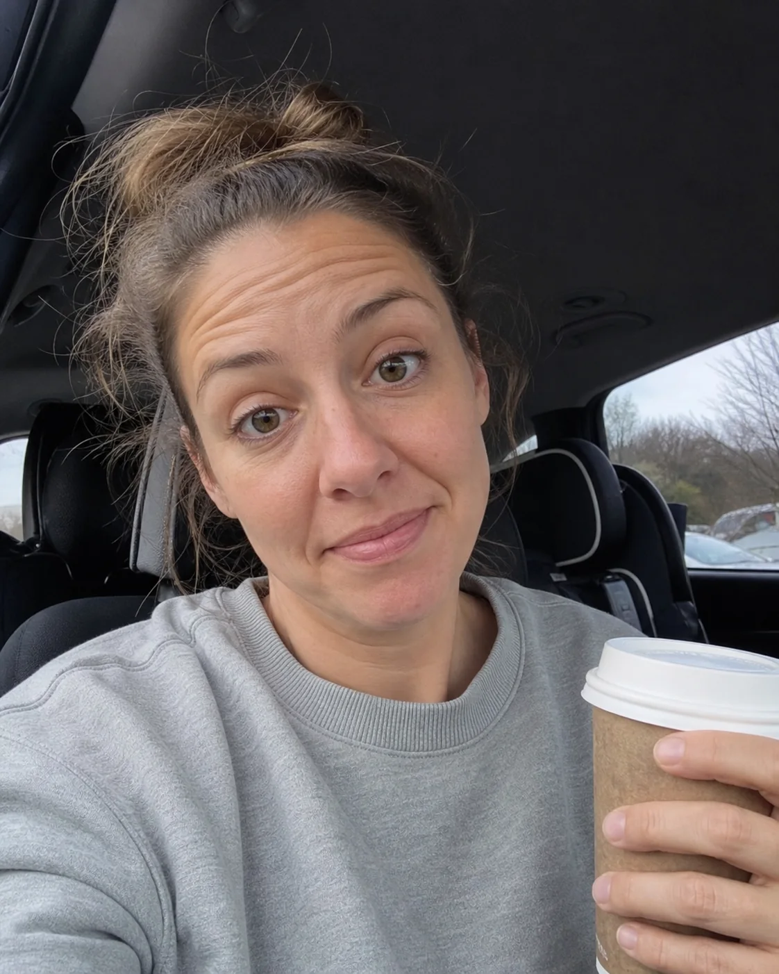 Mum recording in a parked car