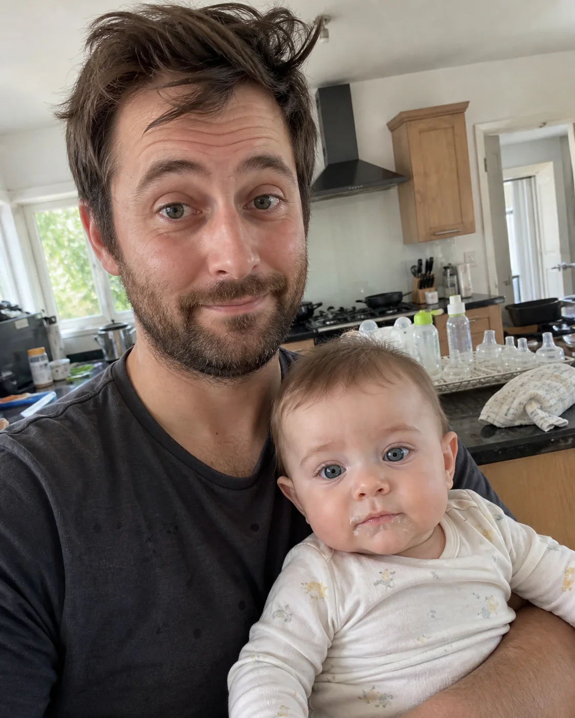 Dad recording after a chaotic bottle feed